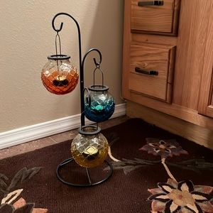 Tri colored candle holder with stand